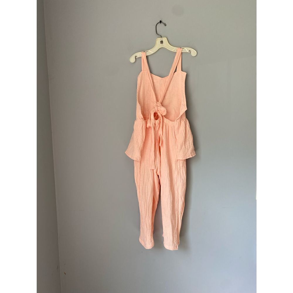 Girls soft peach crêpe/ seersucker like material one piece jumpsuit/open back/s